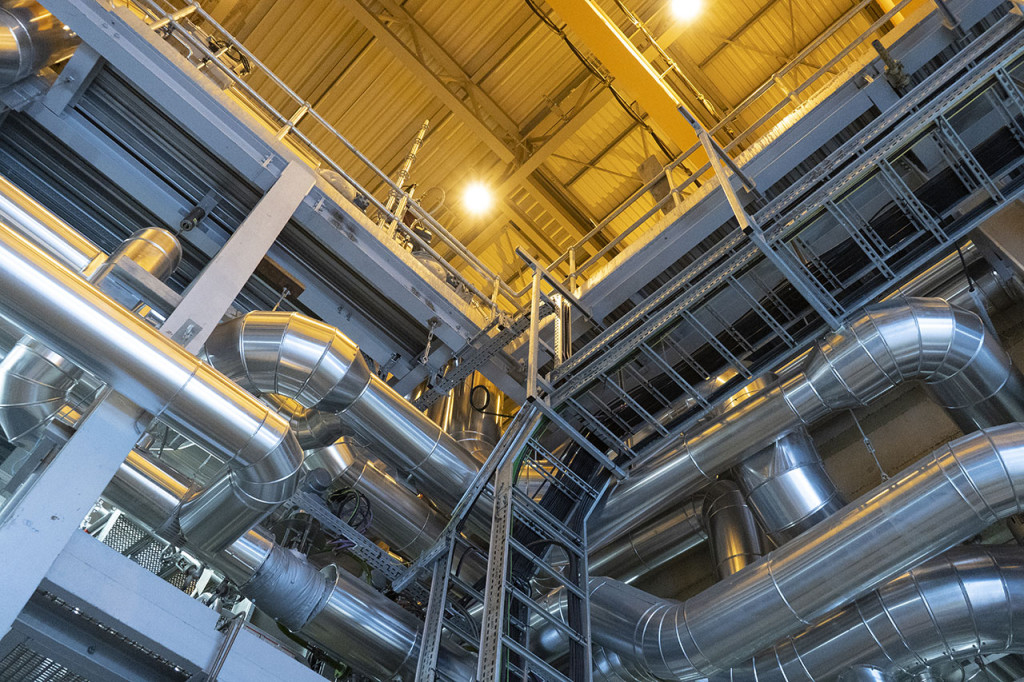 CREDIT: New Dawn, taken by Siobhan Lock at Margam Green Energy Plant in Port Talbot. Winner in the Young Future Technology category of the EEF Photography Competition 2018. CAPTION: Margam Green Energy is an innovative green energy biomass plant which utilises recycled woodchip material. Within the main building a complex network of ducts pass around the outside of the boiler which produces enough energy to superheat the water creating steam at 1000oC. This image looks up into the new dawn of sustainable electricity manufacturing.